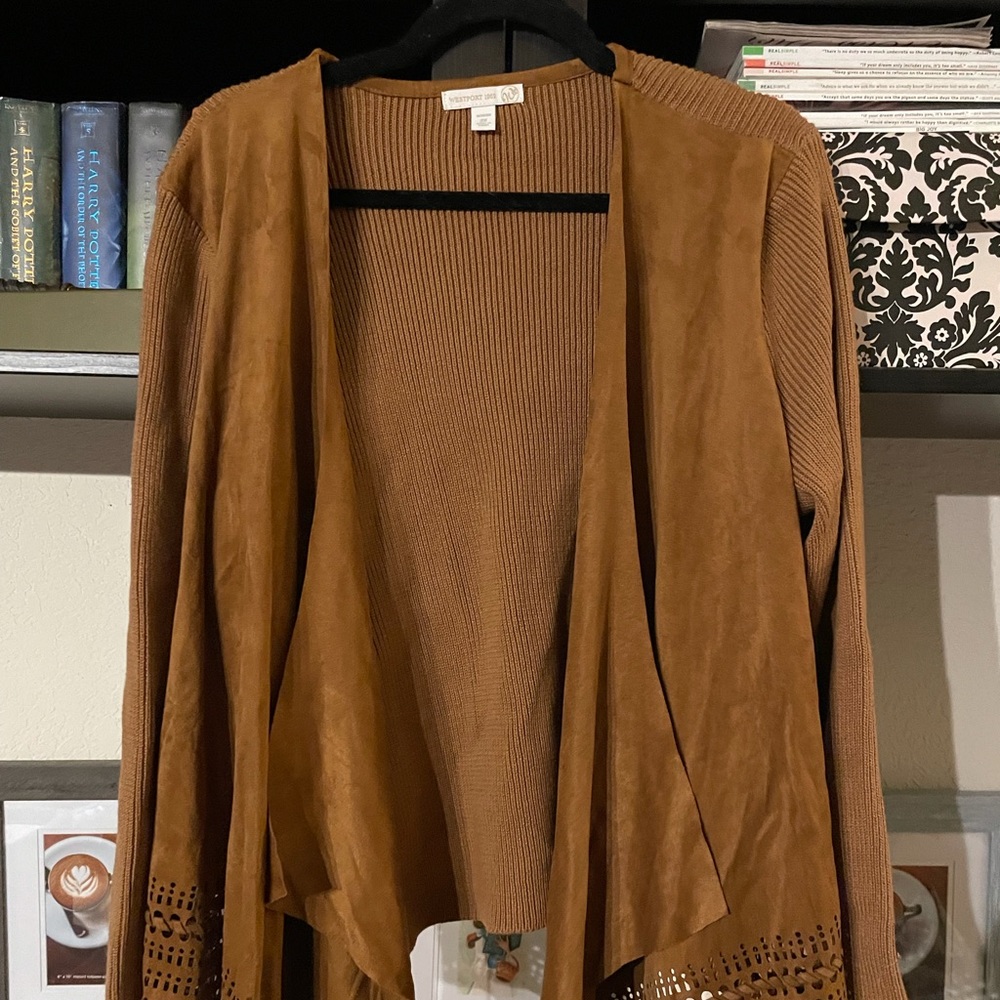 Rust colored sweater with decorative detail